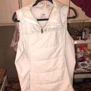 Ladies pull over north face vest.